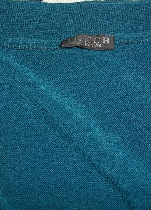 Удлиненный свитер с необычным передом4 фото