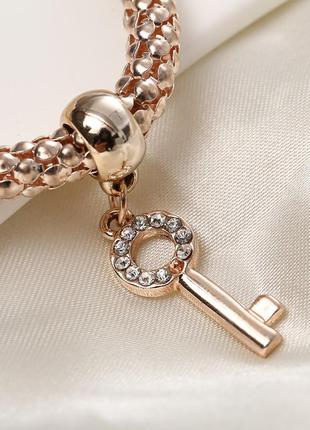 Набір з трьох браслетів з підвісками "замок і ключик" золото,срібло,бронза9 фото