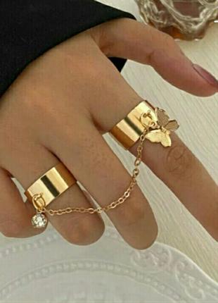 Кольца с цепочкой с бабочкой с кристаллом золотистый  серебристый