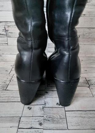 Зимние женские кожаные сапоги shidalis черные на танкетке10 фото