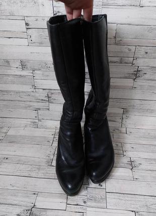 Зимние женские кожаные сапоги shidalis черные на танкетке6 фото