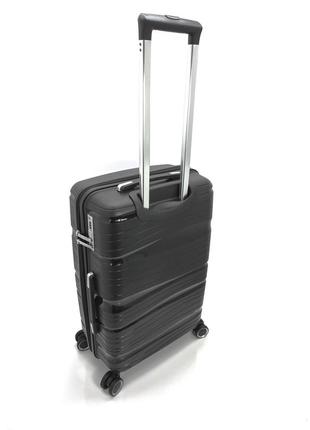 Дорожный пластиковый чемодан большой l  fashion на 4-х колесах светло-серый