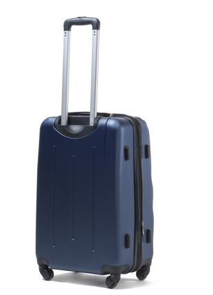 Пластикова дорожня валіза на колесах wings 304 синій розмір s 25x37x55см (ручна поклажа)3 фото