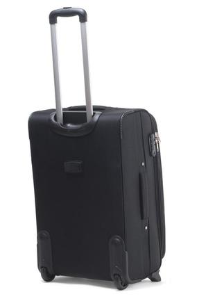 Дорожный текстильный средний чемодан черный на колесах wings размер м тканевый чемодан на 2 колеса вингс2 фото