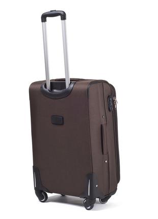 Текстильный средний чемодан на 4 колесах wings чемодан средний вместительный на колесах чемодан коричневый2 фото