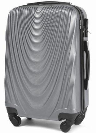 Пластикова велика дорожня валіза на колесах wings 304 серебро розмір l (великий) полікарбонат