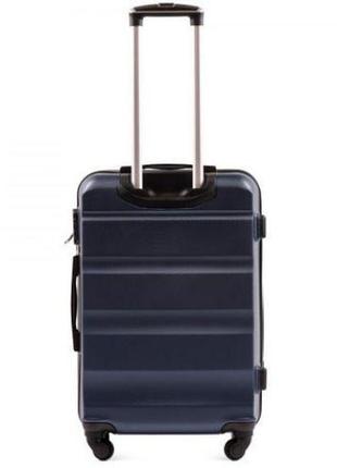 Велика дорожня пластикова валіза на 4 колесах wings синя валіза l чотириколісна міцна валіза великий чемодан л2 фото