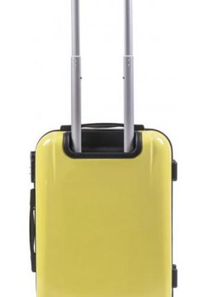 Дорожня дитяча валіза на коліщатках wings жовтого кольору розмір xs (міні) дівчинці, пластикову валізу2 фото