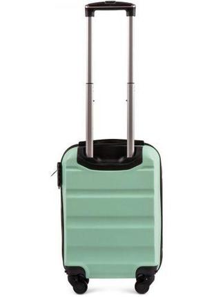 Большой яркий дорожный чемодан на 4 колесах пластиковый мятный размер l sky 306 четырехколесный2 фото