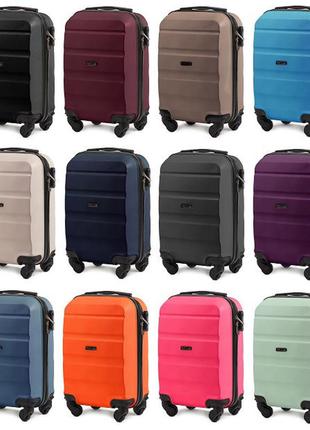 Дорожный чемодан розовый пластиковый на 4 колесиках wings at01 xs(мини) женский чемодан для ручной клади9 фото