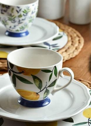 Чашки з лимонами