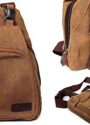 Компактний чоловічий рюкзак - сумочка через плече тканинний.2 фото