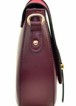 Элегантная женская кожаная сумка-седло (италия) цвета бордо4 фото