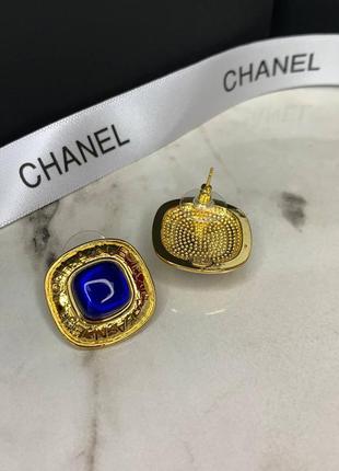Брендовые серьги с синим камнем в позолоте