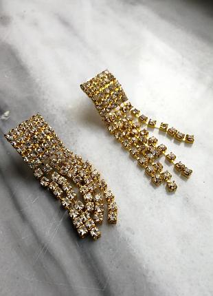 Ошатні кліпси золотисті з білими каменями великі