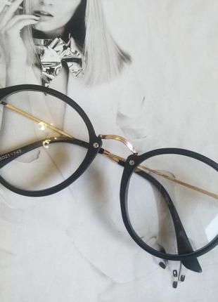 Іміджеві окуляри з прозорою лінзою круглі з металевими дужками прозорий10 фото