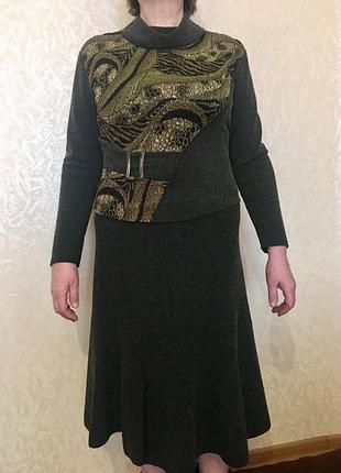 Теплий жіночий костюм.