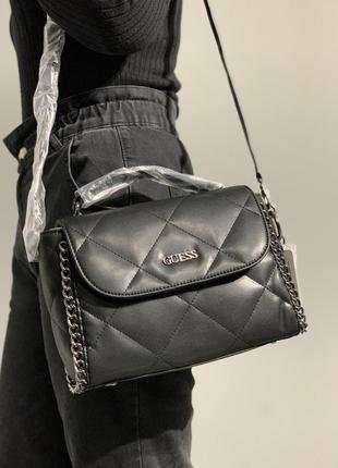 Женская сумка guess khatia top handle flap qm838120 черная1 фото