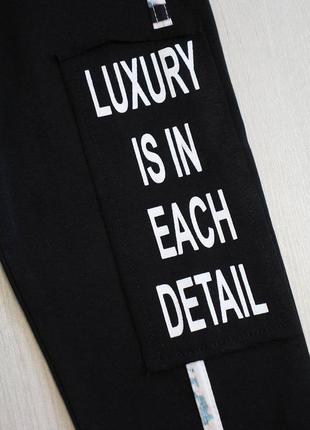 Капри черные для девочки "luxury is in each detail" (140 см.)  nk unsea 86601000541926 фото