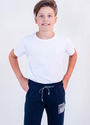 Біла футболка без декору для дитини (110 див.) lovetti 8683032011224