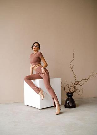 Модні трикотажні штани жіночі з розрізами