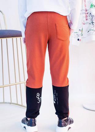 Спортывные штаны яркого цвета для мальчика (128 см.)  nk unsea 86601001312682 фото