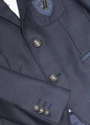 Тёмно-синий пиджак для мальчика (146 см.)  herdal 21260002305323 фото