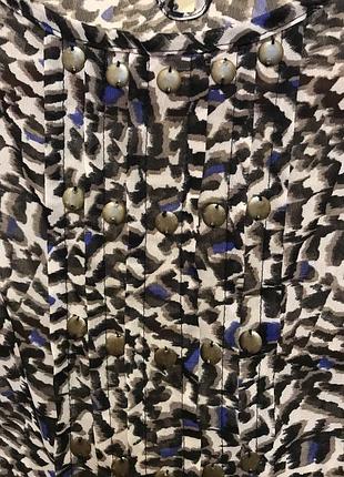 Дуже гарна і стильна брендовий блузка великого розміру.