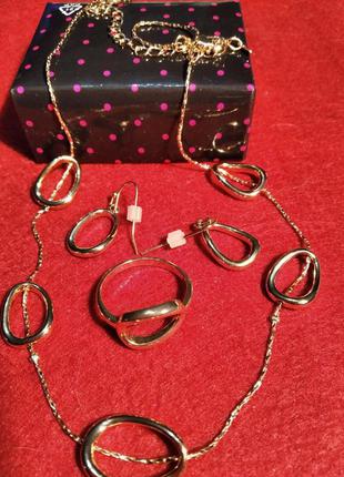Комплект бижутерии : ожерелье, сережки, кольцо1 фото