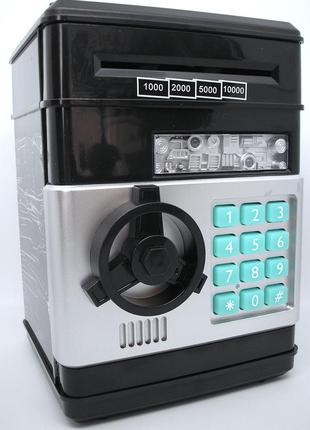 Сейф скарбничка електронна з купюроприйомником, звуковими ефектами і кодовим замком затягує купюри2 фото