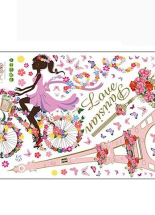 Наклейка інтер'єрна на стіну "дівчинка на велосипеді".2 фото
