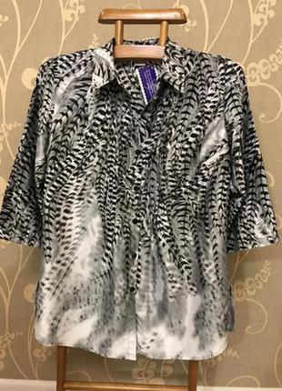 Очень красивая и стильная брендовая блузка.