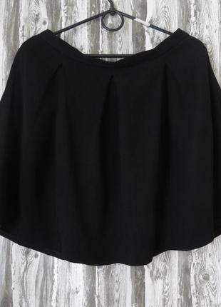 Черная юбка со складками и карманами размер 46-48