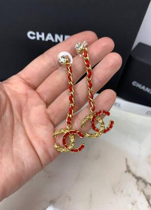 Брендовые длинные серьги с кожаной вставкой в позолоте