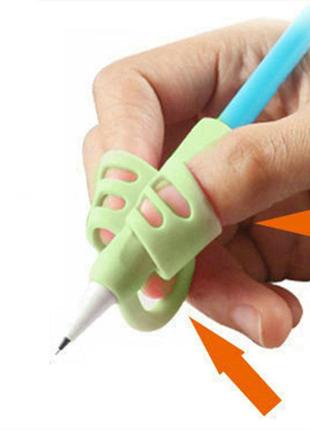 Тренажер для ручок і олівців насадка на 3 пальці для правильного листи дітям школярам1 фото