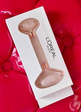 Массажный роллер из розового кварца l’oréal .