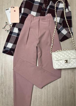 Ніжно-рожеві брюки