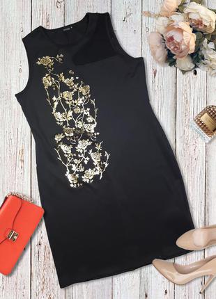 Элегантное платье-футляр с золотым принтом2 фото