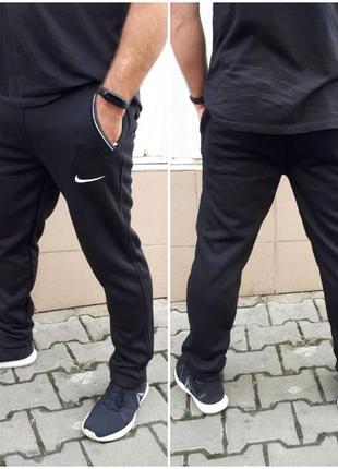 Спортивные штаны утепленные унисекс трикотажные на флисе nike2 фото