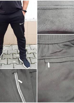 Спортивные штаны утепленные унисекс трикотажные на флисе nike3 фото