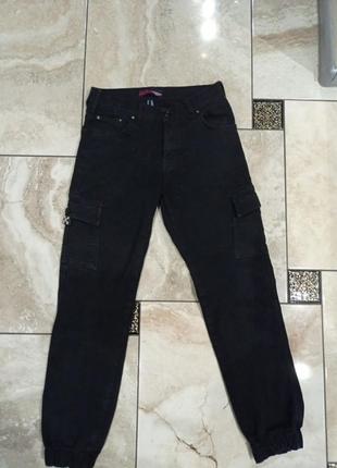 Джинсы с карманами