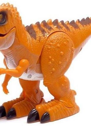Іграшка динозавр на пульті управління1 фото