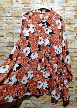 Блуза а-силуету з квітковим принтом