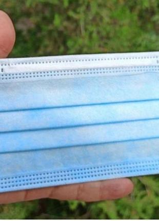 Маска медична блакитна для особи 10 шт одноразова тришарова захисна штампована з затиском для носа1 фото