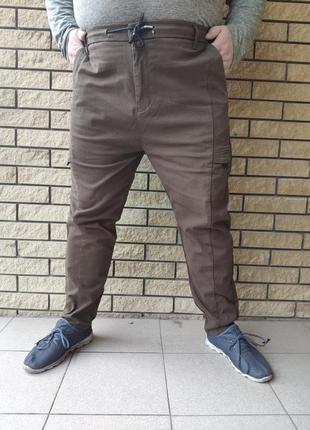 Джоггеры, джинсы с поясом  на резинке  унисекс, накладные карманы карго,  большие размеры nn5 фото