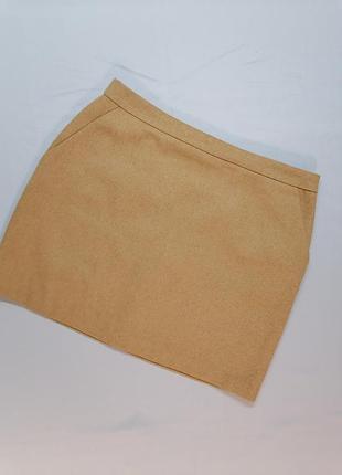 Тепла спідниця з кишенями кольору кэмал міні тепла спідниця з кишенями
