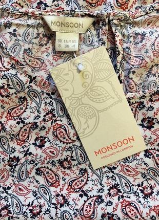 Очень красивая и стильная брендовая блузка в узорах..100% вискоза.