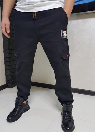 Джоггеры, джинсы на резинке стрейчевые коттоновые  унисекс, накладные карманы карго,  nn3 фото
