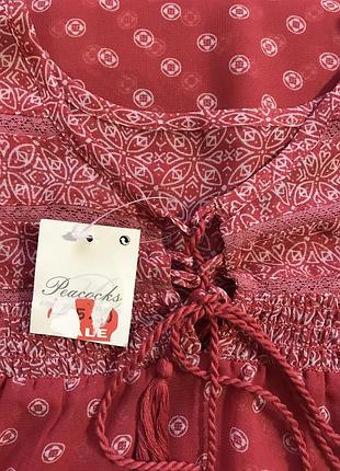 Очень красивая и стильная брендовая блузка.