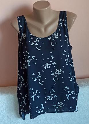 Состояние новой!суперова хорошенькая блузочка, вказано р. 16.